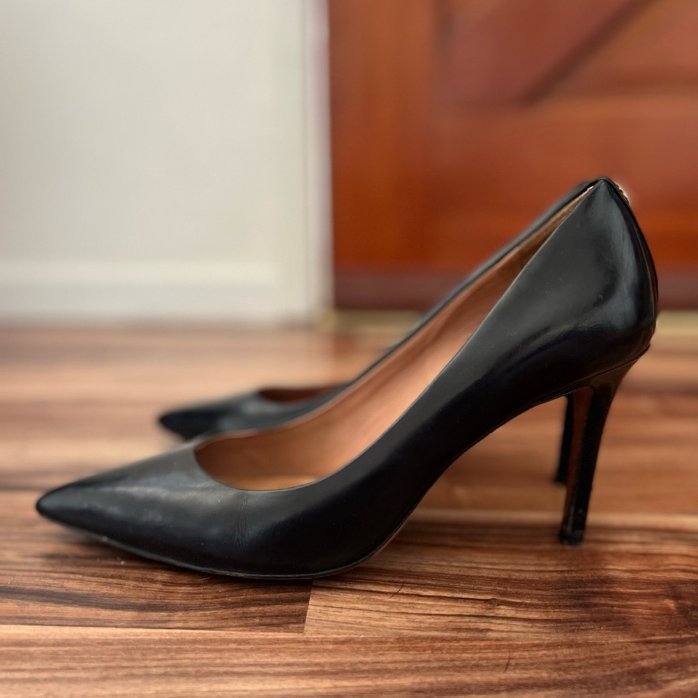Coach black leather pumps